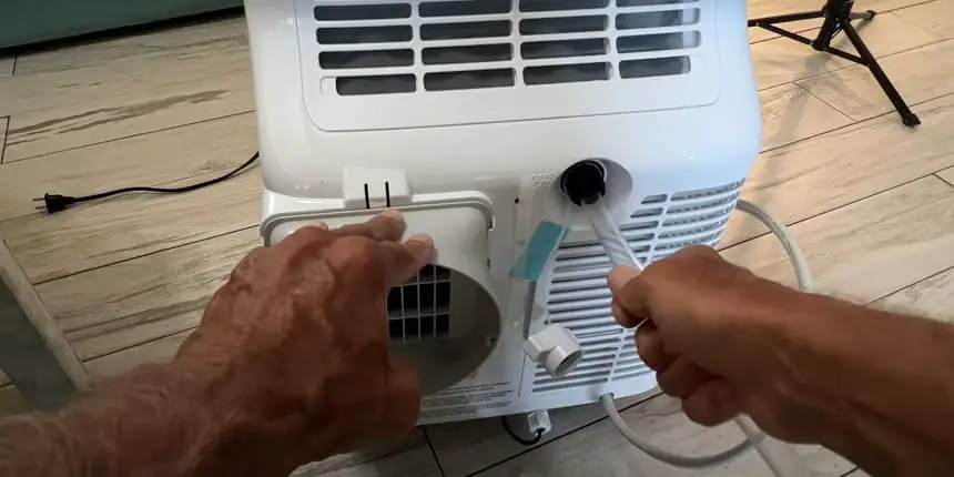 portable air conditioner filling up with water